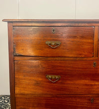 Load image into Gallery viewer, An immaculate quality Arts & Crafts chest of drawers made in figured English mahogany. Having an arrangement of 2 over 2 drawers, all retaining the original decorative handles and escutcheons. With mahogany sides on a plinth. Beautiful original condition throughout. English, Circa 1900.