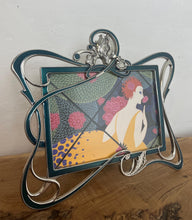 Load image into Gallery viewer, Beautiful vintage picture frame designed in the Art Deco style, featuring ornate, flowing lines and a green enamel finish. It is made from metal, likely pewter or a silver-plated alloy.
