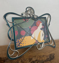 Load image into Gallery viewer, Beautiful vintage picture frame designed in the Art Deco style, featuring ornate, flowing lines and a green enamel finish. It is made from metal, likely pewter or a silver-plated alloy.
