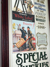 Load image into Gallery viewer, It includes a depiction of a seated Scotsman with a glass of whisky, and another scene below showing men with a cart, which are classic elements of Dewar's vintage advertising campaigns.