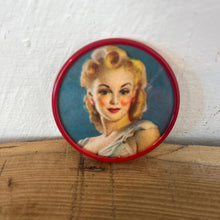 Load image into Gallery viewer, Beautiful mid-century vintage compact mirrors or small circular handbag mirrors featuring pin-up style art from the mid-20th century.