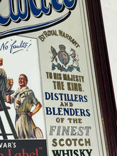 Load image into Gallery viewer, It includes a depiction of a seated Scotsman with a glass of whisky, and another scene below showing men with a cart, which are classic elements of Dewar's vintage advertising campaigns.