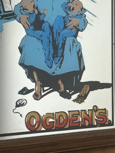 Load image into Gallery viewer, This mid-20th-century advertising piece features an illustration of a man smoking a pipe while holding two babies, conveying a sense of contentment associated with the tobacco.