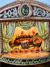 Load image into Gallery viewer, This style of hand-painted, glazed ceramic item, sometimes featuring floral designs or specific scenes, has a whimsical, hand-painted design with a military theme, incorporating several small seated toy figures and a cannon figurine.