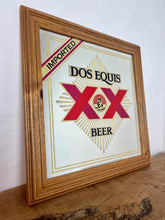 Load image into Gallery viewer, The design features the brand name, the "XX" symbol, the word "BEER", and the face of an Aztec ruler in the centre.