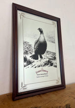 Load image into Gallery viewer, The Famous Grouse advertising wall mirror featuring the brand's iconic red grouse image and the slogan "Quality in an age of change"