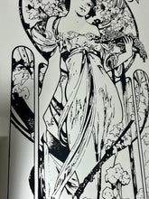 Load image into Gallery viewer, Gorgeous, vibrant Art Nouveau mirror featuring stunning, intricate designs of a beautiful lady against a floral background, with a stand-on designer branding with the famous champagne maker.