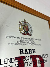 Load image into Gallery viewer, The most prominent feature is the large, bold, red "J&B" logo in a distinctive typeface.