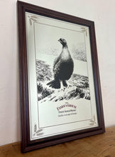 Load image into Gallery viewer, The Famous Grouse advertising wall mirror featuring the brand's iconic red grouse image and the slogan "Quality in an age of change"