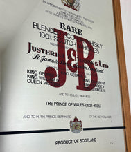 Load image into Gallery viewer, The most prominent feature is the large, bold, red "J&B" logo in a distinctive typeface.