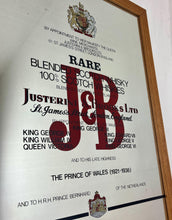 Load image into Gallery viewer, The most prominent feature is the large, bold, red "J&B" logo in a distinctive typeface.