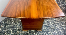 Load image into Gallery viewer, Vintage Art Deco dining table, dating from the 1930s.
The table is primarily crafted from burr walnut, often featuring highly figured or "book-matched" walnut veneers on the top surface to showcase striking natural grain patterns.