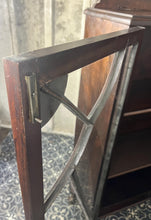 Load image into Gallery viewer, This antique Art Deco furniture piece is a mahogany glazed display cocktail cabinet or bookcase, known for its rich colour and prominent grain, dating from the 1930s.