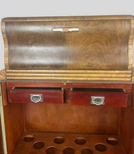 Load image into Gallery viewer, This stunning piece of furniture is an antique Art Deco cocktail cabinet, dating from the 1930’s. It is crafted from figured walnut veneer, a hallmark of the period, known for its distinctive, decorative grain patterns.