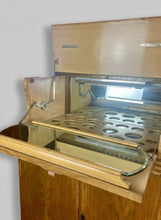 Load image into Gallery viewer, This stunning piece of furniture is an antique Art Deco cocktail cabinet, dating from the 1930’s. It is crafted from figured walnut veneer, a hallmark of the period, known for its distinctive, decorative grain patterns.
