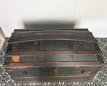 Load image into Gallery viewer, This beautiful piece is an antique dome-top (or barrel-top) steamer trunk, commonly manufactured during the late 19th century (circa 1870–1900).