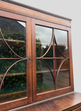 Load image into Gallery viewer, Beautiful Georgian mahogany inlaid secrétaire bookcase, a classic 18th century British furniture design. It combines a display cabinet, a pull-out hidden desk space, and a functional chest of drawers into a single multi-tier case piece.