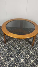 Load and play video in Gallery viewer, Chic Bohemian vintage teak coffee table, living room interior, Scandinavian furniture, smoked glass design, retro home decor