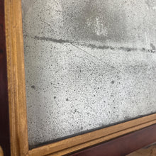 Load image into Gallery viewer, A mid-19th-century rosewood overmantle mirror in landscape form, the frame has classical columns to the sides, and top with gilt collars, and the gilt frame edging has detailed ball feet to create a standout period design.