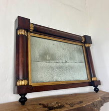 Load image into Gallery viewer, A mid-19th-century rosewood overmantle mirror in landscape form, the frame has classical columns to the sides, and top with gilt collars, and the gilt frame edging has detailed ball feet to create a standout period design.