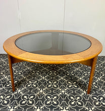 Load image into Gallery viewer, Lovely vintage chic Scandinavian coffee table which comes with an original natural light circular teak colour and smoked glass top, which creates a superb interior design.