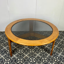 Load image into Gallery viewer, Lovely vintage chic Scandinavian coffee table which comes with an original natural light circular teak colour and smoked glass top, which creates a superb interior design.