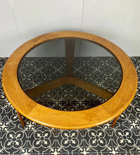 Load image into Gallery viewer, Lovely vintage chic Scandinavian coffee table which comes with an original natural light circular teak colour and smoked glass top, which creates a superb interior design.