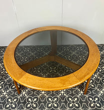 Load image into Gallery viewer, Lovely vintage chic Scandinavian coffee table which comes with an original natural light circular teak colour and smoked glass top, which creates a superb interior design.