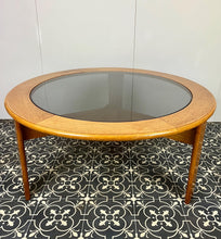 Load image into Gallery viewer, Lovely vintage chic Scandinavian coffee table which comes with an original natural light circular teak colour and smoked glass top, which creates a superb interior design.