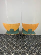Load image into Gallery viewer, They are introducing a stylish and functional set of chairs from Kusch+Co. The teal blue/green colour adds a touch of retro elegance to any kitchen or dining room. At the same time, the 1970s hairpin legs and atomic-inspired backrests