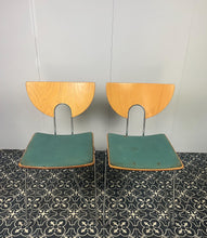 Load image into Gallery viewer, They are introducing a stylish and functional set of chairs from Kusch+Co. The teal blue/green colour adds a touch of retro elegance to any kitchen or dining room. At the same time, the 1970s hairpin legs and atomic-inspired backrests