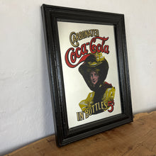 Load image into Gallery viewer, The beautiful mirror had a square picture with a Victorian lady in stylish evening clothing, the brand and fonts and a beautiful, vibrant, colourful text in gold and red. The border is a square design with lovely, vivid details.