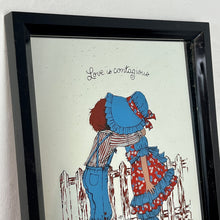 Load image into Gallery viewer, A beautiful mirror showcasing a young child in bright farm attire hugging against a backdrop of farm animals, creating a joyful and heartwarming piece.