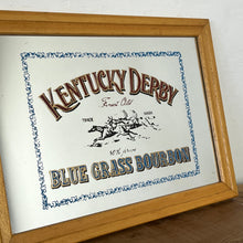Load image into Gallery viewer, features a horse racing design. The branding is depicted in bold, vivid fonts in red and blue, and there is an intricate picture of a horse race along with a blue floral border.