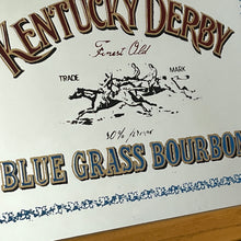 Load image into Gallery viewer, features a horse racing design. The branding is depicted in bold, vivid fonts in red and blue, and there is an intricate picture of a horse race along with a blue floral border.