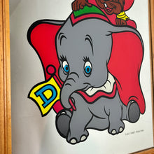 Load image into Gallery viewer, Stunning vintage Disney Dumbo mirror featuring the famous elephant and Timothy the mouse in beautiful vivid tones in bright stand out colours to make and impact in any Disney collectors home or children room.