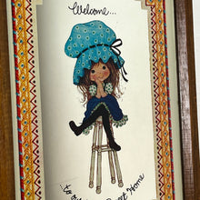 Load image into Gallery viewer, The mirror depicts Miss Petticoat in vibrant colours and would make a great addition to any art collection. Intricate, vivid border, welcome to our home sweet home.