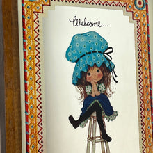 Load image into Gallery viewer, The mirror depicts Miss Petticoat in vibrant colours and would make a great addition to any art collection. Intricate, vivid border, welcome to our home sweet home.