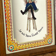 Load image into Gallery viewer, The mirror depicts Miss Petticoat in vibrant colours and would make a great addition to any art collection. Intricate, vivid border, welcome to our home sweet home.