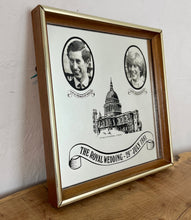 Load image into Gallery viewer, Vibrant mirror featuring the wedding of Charles and Diana on the 29th of July 1981 with a portrait of the couple and intricate picture of St Pauls and the fonts in a banner design.
