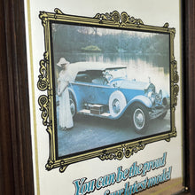 Load image into Gallery viewer, glamourous design with antique picture of the luxury car in intricate finish, excellent quote in stylish fonts with a detailed gold border and red logo of the brand.