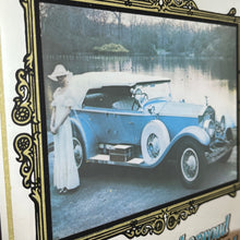 Load image into Gallery viewer, glamourous design with antique picture of the luxury car in intricate finish, excellent quote in stylish fonts with a detailed gold border and red logo of the brand.