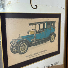 Load image into Gallery viewer, Vintage prestige Rolls Royce Silver Ghost 1912 advertising mirror featuring a glamourous design with antique pictures of the luxury car in intricate finish, excellent quotes in stylish fonts with a straight gold border.