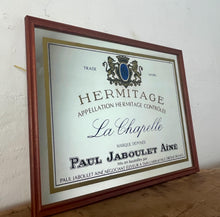 Load image into Gallery viewer, Paul Jaboulet Aine La Chapelle wine advertising mirror in an elegant design of the famous French exclusive wine producer with multiple classy fonts on the branding with the intricate gold motif logo and a sleek gold and black border.
