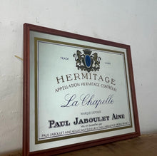 Load image into Gallery viewer, Paul Jaboulet Aine La Chapelle wine advertising mirror in an elegant design of the famous French exclusive wine producer with multiple classy fonts on the branding with the intricate gold motif logo and a sleek gold and black border.
