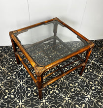 Load image into Gallery viewer, Stunning intertwined woven corners with magnificent craftsmanship finish towards the bottom of a bamboo rack to store books or newspapers come with a sleek glass top.
