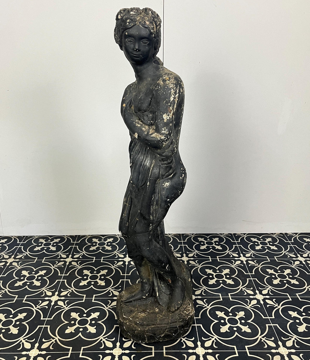 This statue is Neoclassical in design with Venus depicted holding draped fabric to conceal her nudity and stands on a square base with classy ebonised finish with lovely detail and style