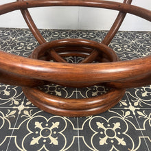 Load image into Gallery viewer, Stunning intertwined bentwood frame with magnificent craftsmanship finish towards the bottom of a woven bamboo base with a sleek glass top.
