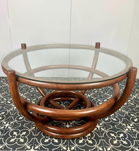 Load image into Gallery viewer, Stunning intertwined bentwood frame with magnificent craftsmanship finish towards the bottom of a woven bamboo base with a sleek glass top.
