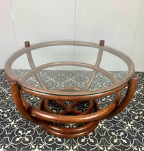 Load image into Gallery viewer, Stunning intertwined bentwood frame with magnificent craftsmanship finish towards the bottom of a woven bamboo base with a sleek glass top.
